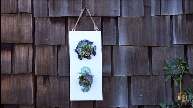 Kaarshouder met succulenten